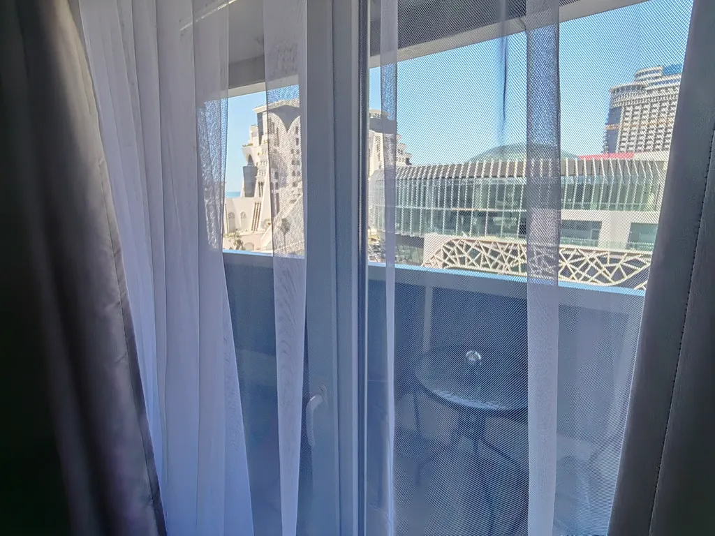 Квартира Квартира Большая студия с балконом и видом на море. 425 — Батуми