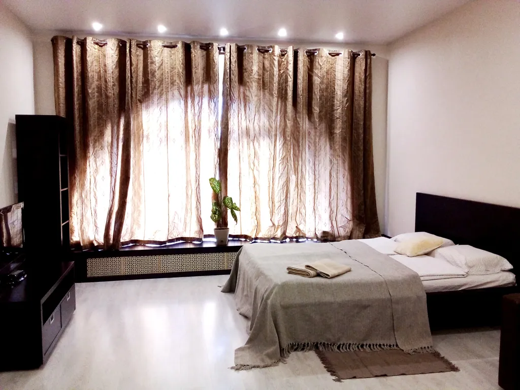 Солнечные апартаменты с панорамным окном и видом на Красную площадь