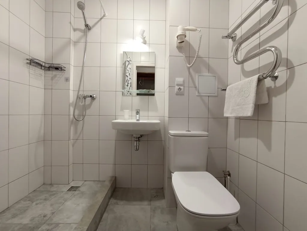 Комфорт с 2 кроватями и балконом с видом на сад