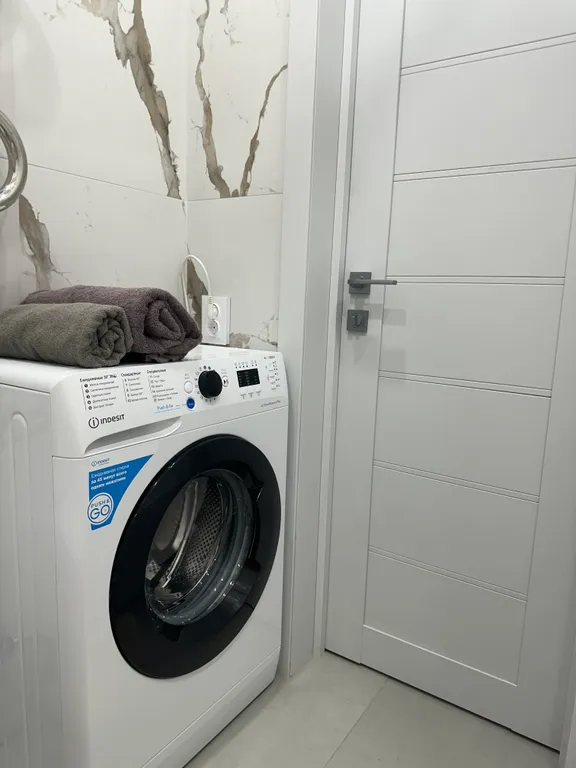 Квартира в тихом приморском районе, в тени деревьев