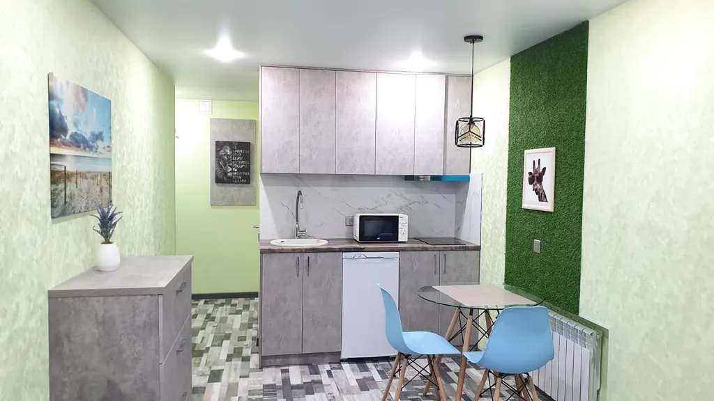 Новая квартира-студия в самом центре города с дизайнерским ремонтом