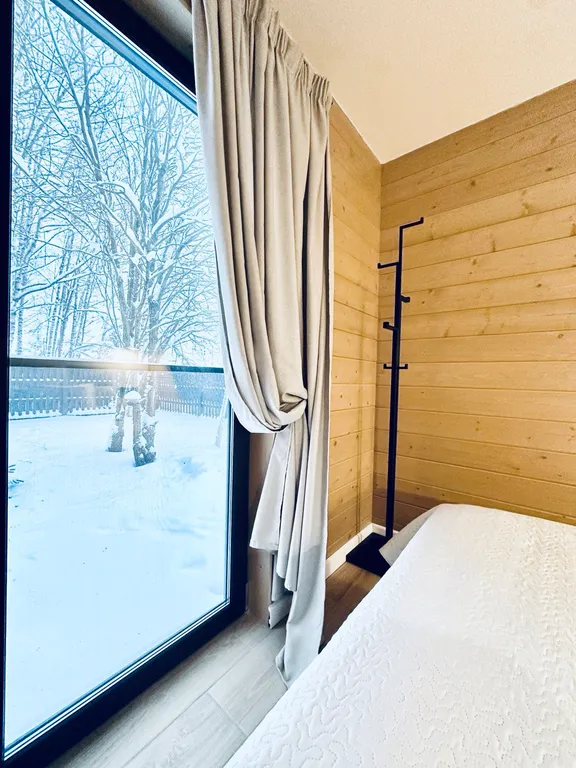 Новый панорамный барнхаус с сауной на лесном участке