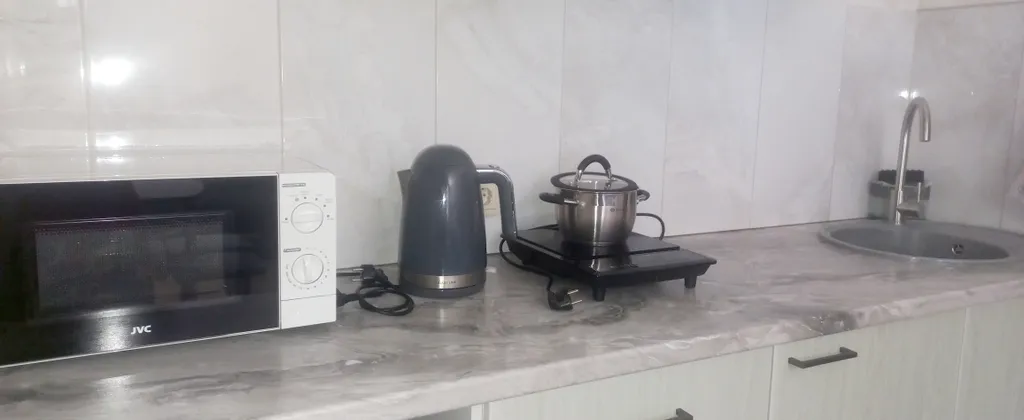 Гуамкаюг. Дом с купелью и видом на горы