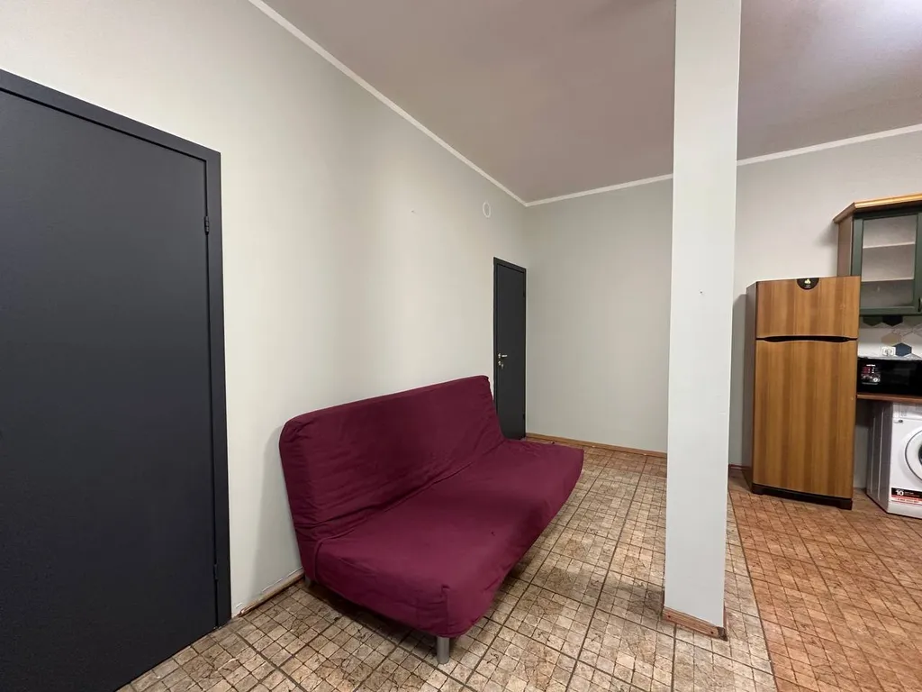 Бюджетная комната для 3 человек, вид на крыши, самый центр