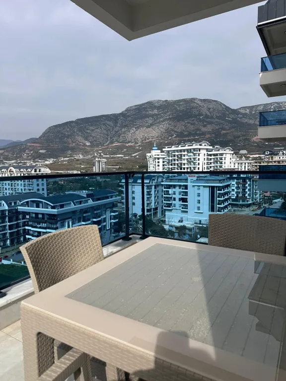 Светлая уютная квартира в Махмутларе с панорамным видом на море и горы