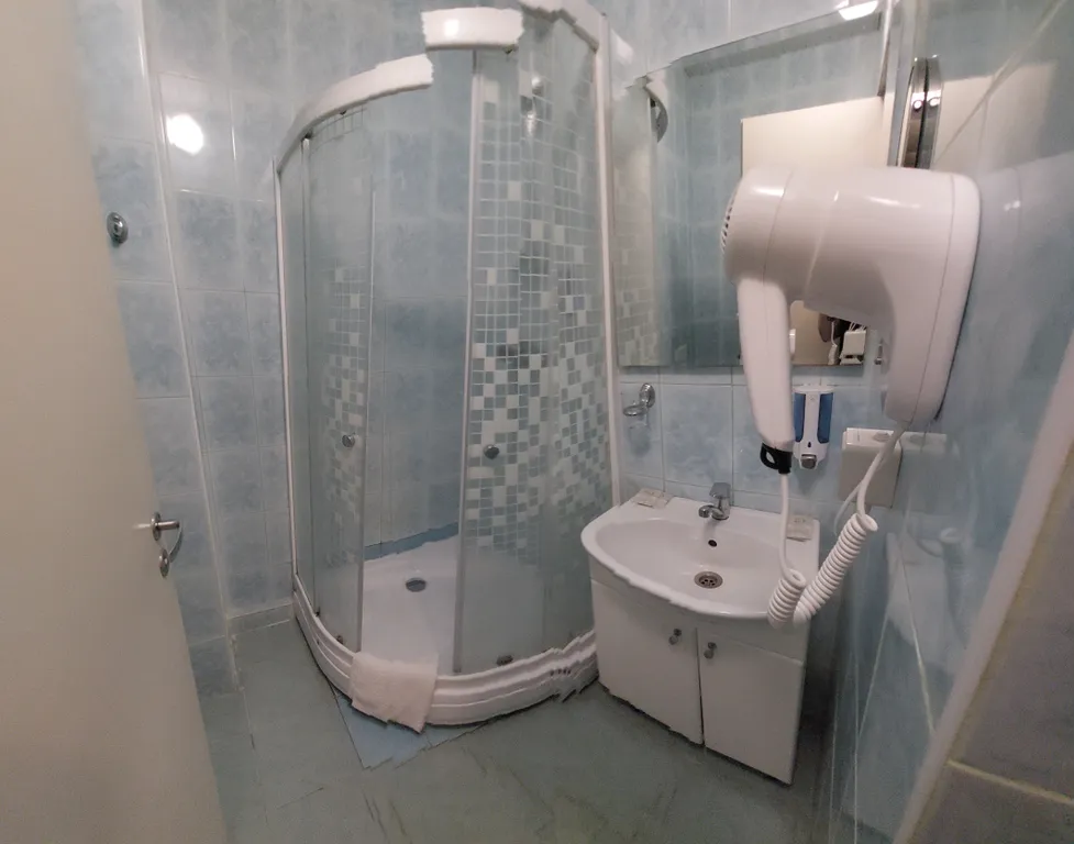 Номер на пятом этаже с видом на горы