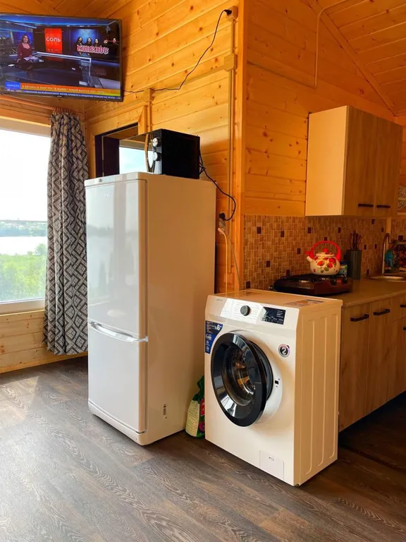 Коттедж Уютный домик на берегу озера Волго — Ланино