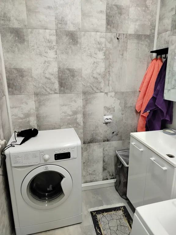 Уютная квартира в новом доме в 10 минутах от центра города