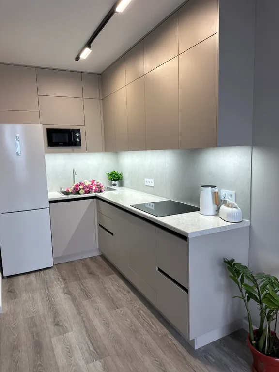 Уютная квартира в новом комплексе с дизайнерским ремонтом