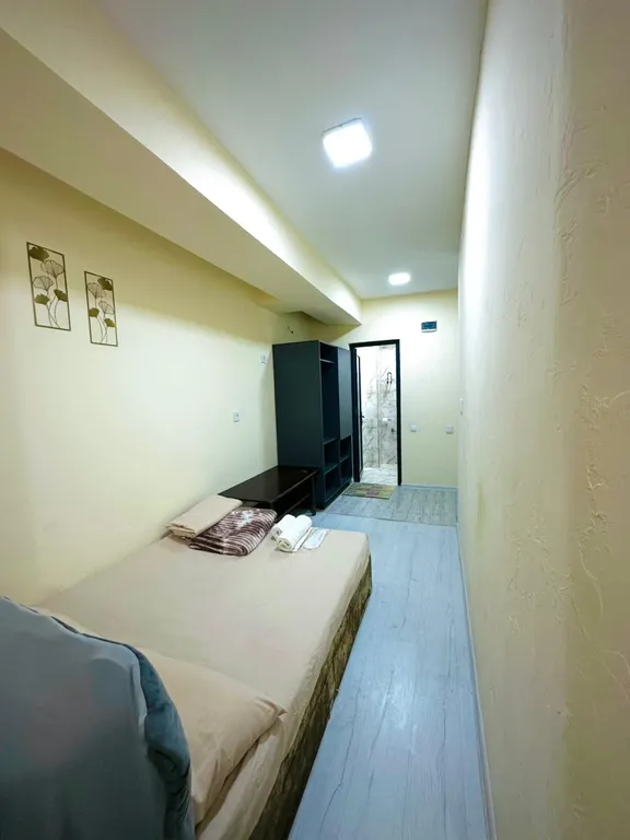 В центре рядом с музеем Сергея Параджанова