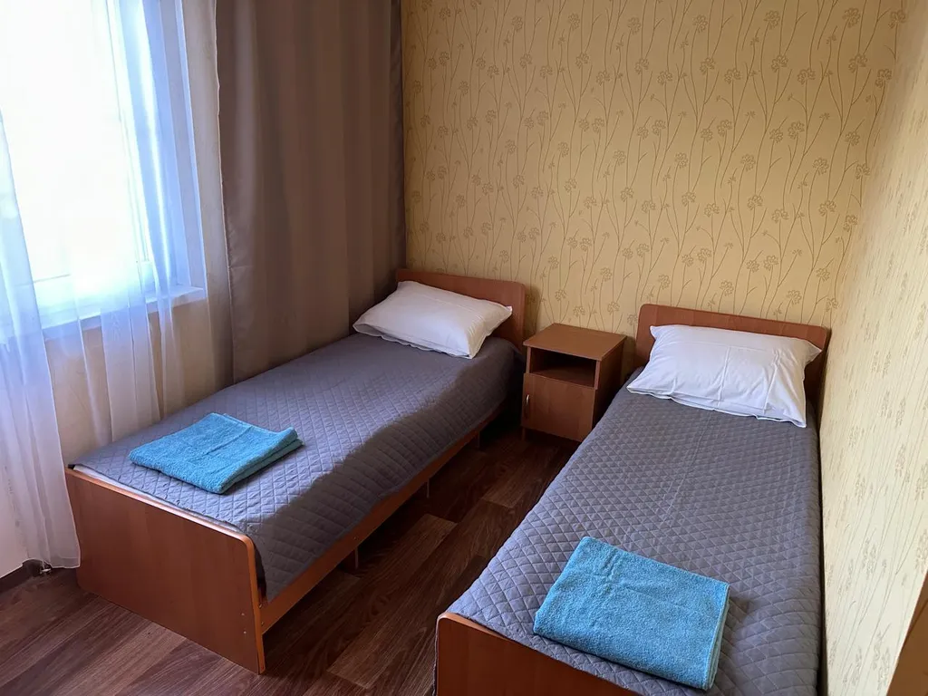 Двухместный номер с 2 отдельными кроватями, с видом на сад