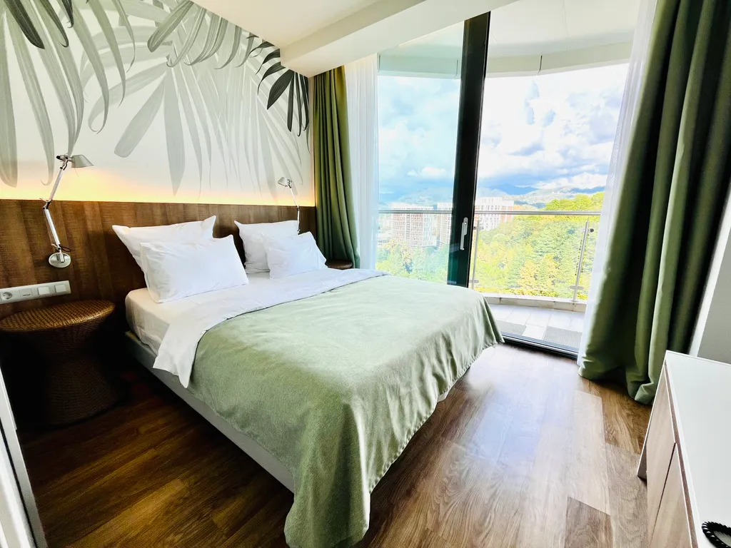 Видовой апартамент с видом на горы в апарт-отеле