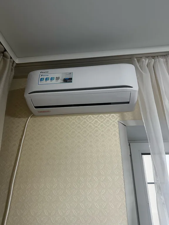 Квартира-студия с новой кроватью и кондиционером