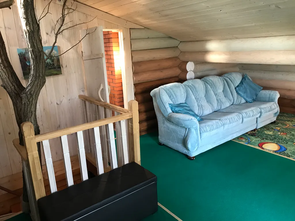 Дом из бревна Терем с сауной в черте города