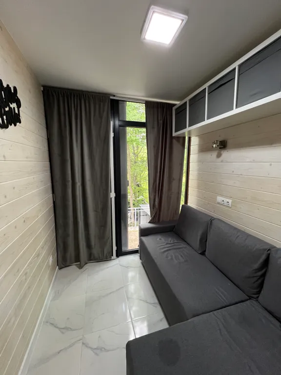 Домик в лесу с большой верандой