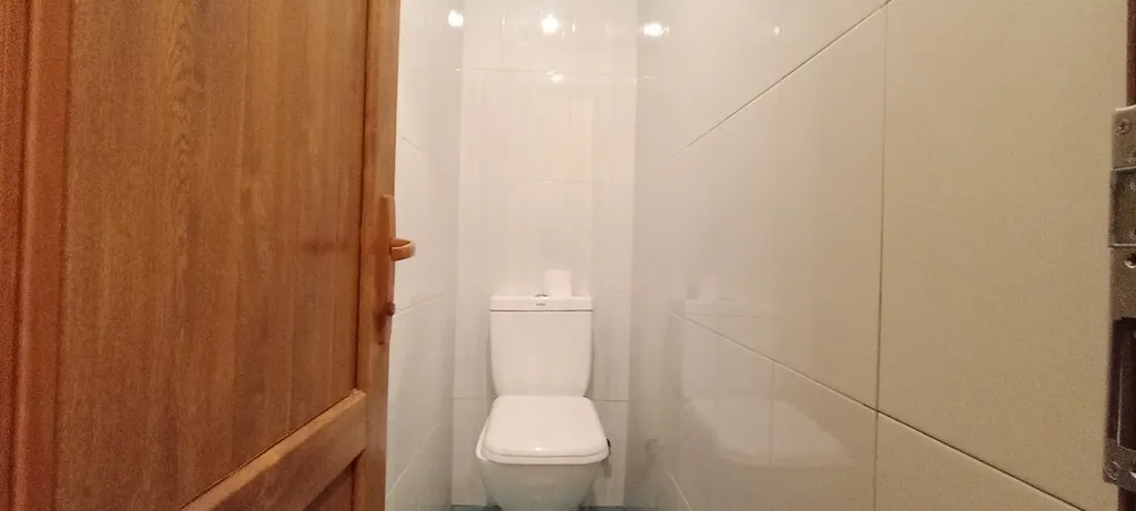 Уютный гостевой дом с частными комнатами и общим санузлом