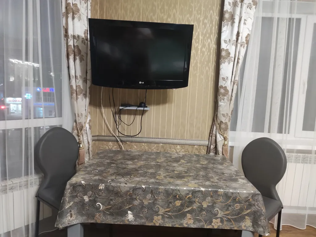 Уютная студия с видом на город