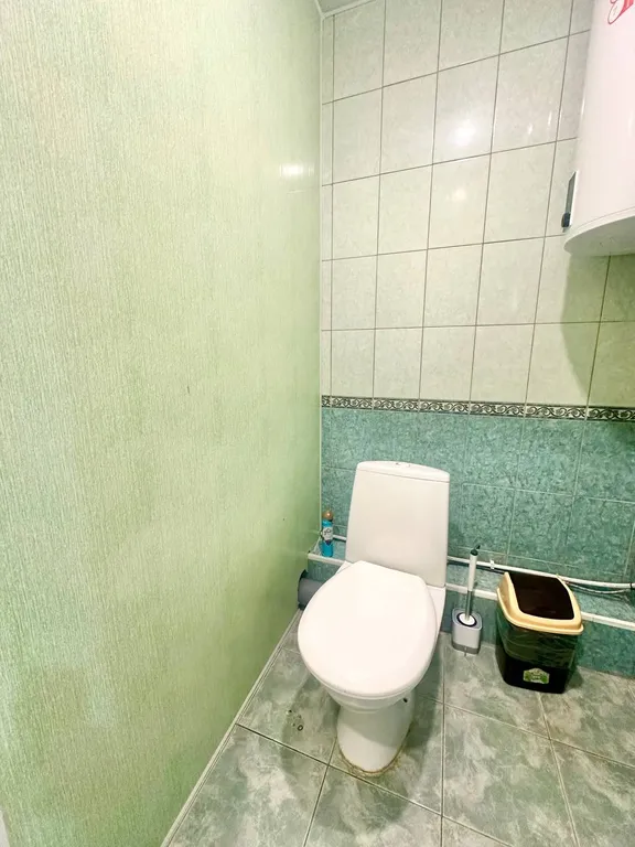 Бюджетная комната для 3 человек, вид на крыши, самый центр