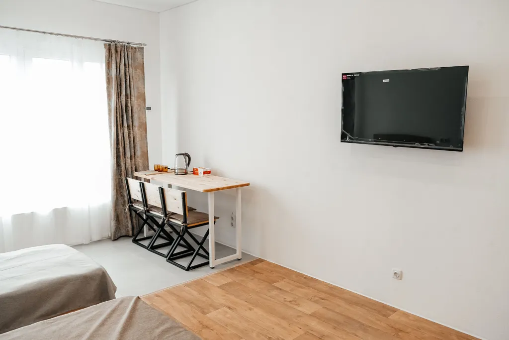 Современный трехместный номер в доме с видом на океан и вулканы