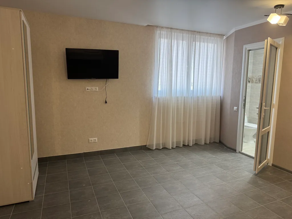 Половина Коттеджа