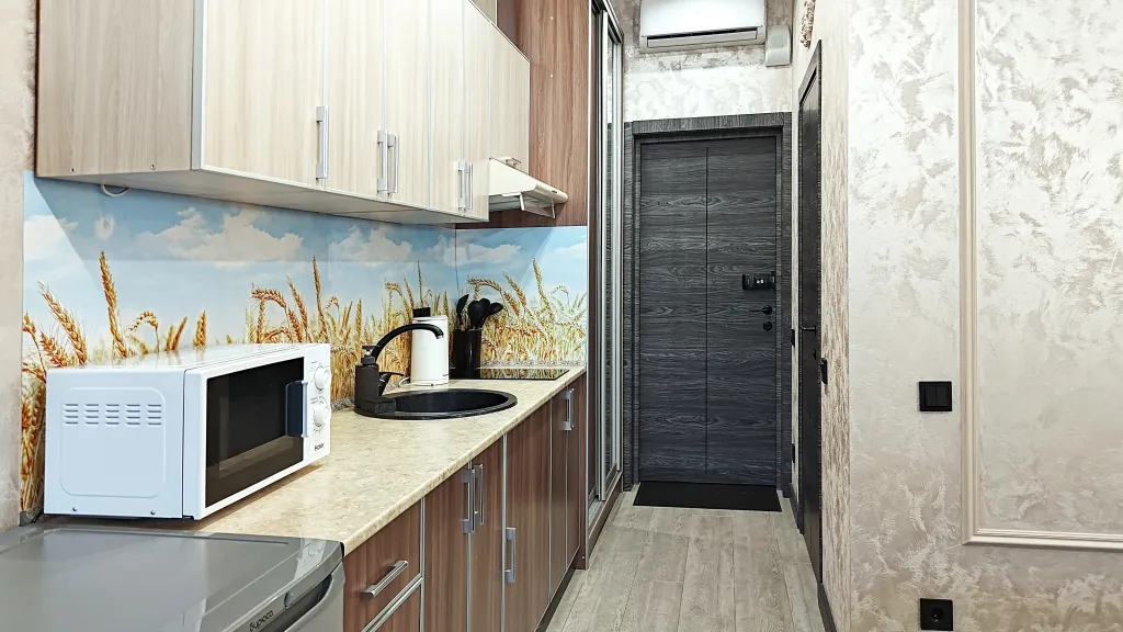 Уютная студия с балконом и красивым видом на горы