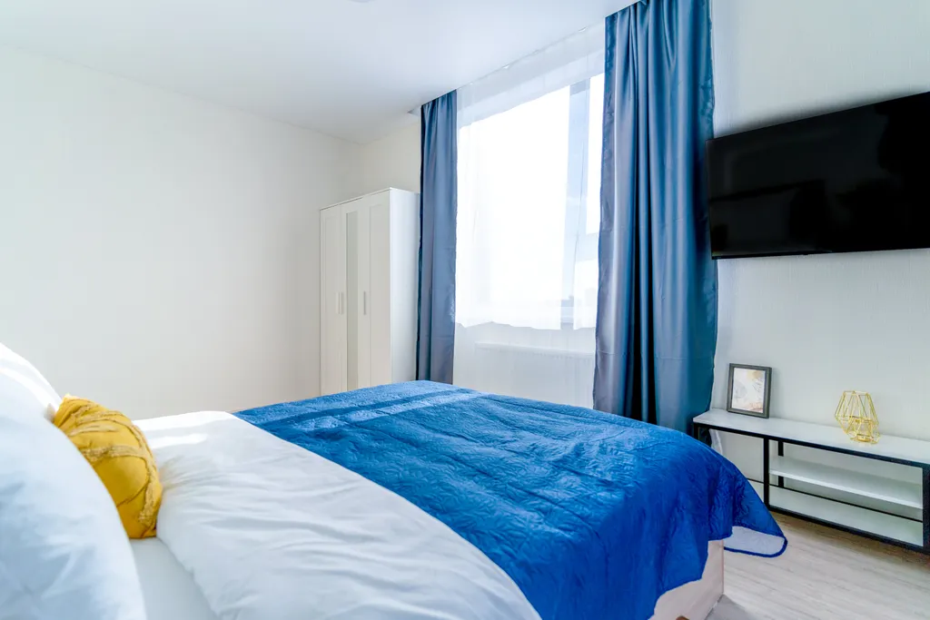 Апартамент с угловой солнечной спальней и видом на город