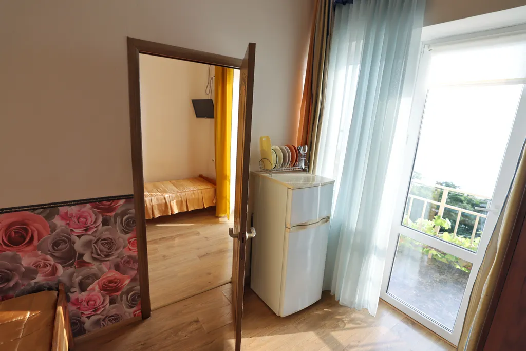 Квартира Квартира Четырехместный номер люкс с доп. местом и балконом с видом на море — Лазаревское