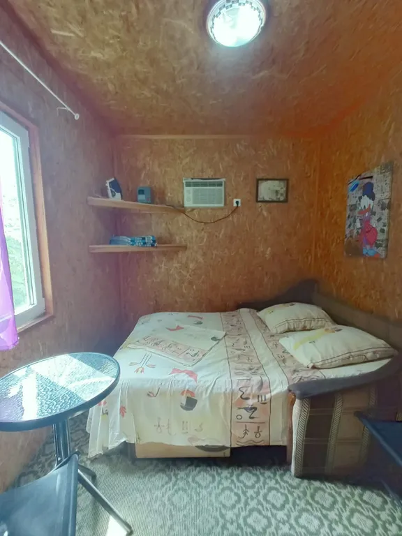 Домик на берегу реки