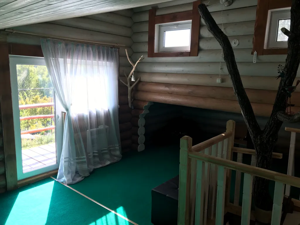 Дом из бревна Терем с сауной в черте города