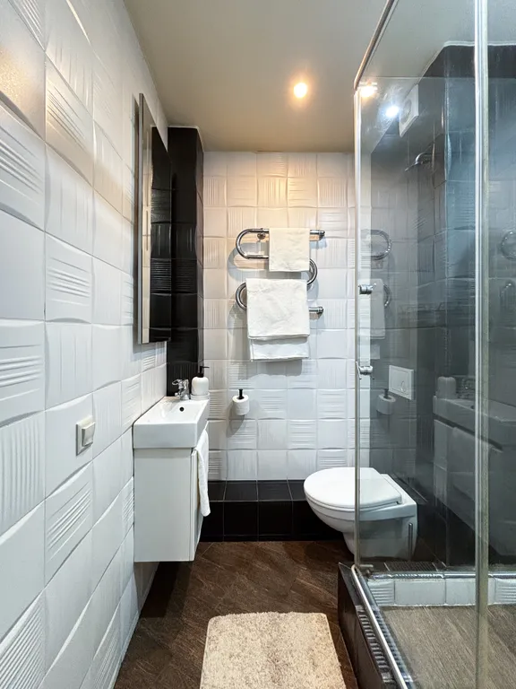 Уютные апартаменты на 25 этаже