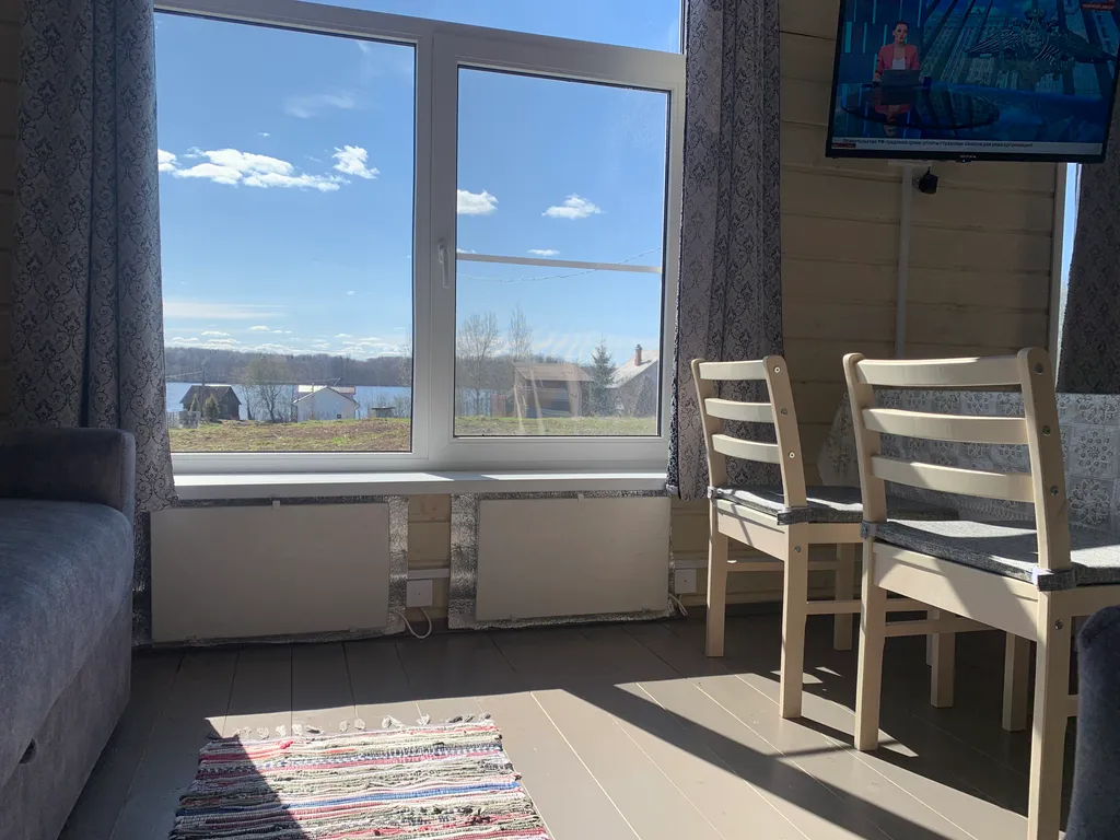 Коттедж Уютный дом с баней и видом на озеро Врево — Луга