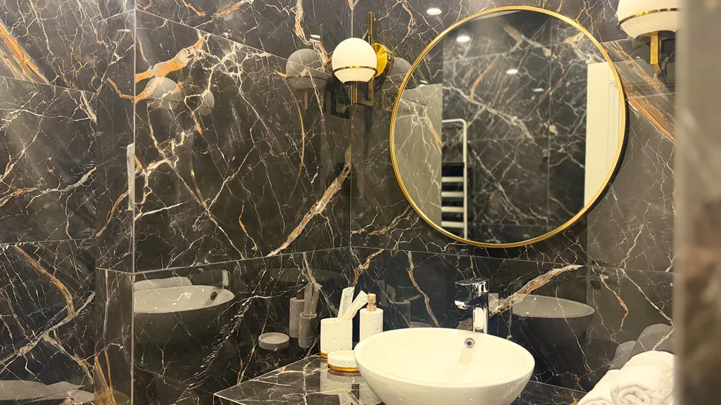 Дизайнерские апартаменты в центре города с 2-мя спальнями