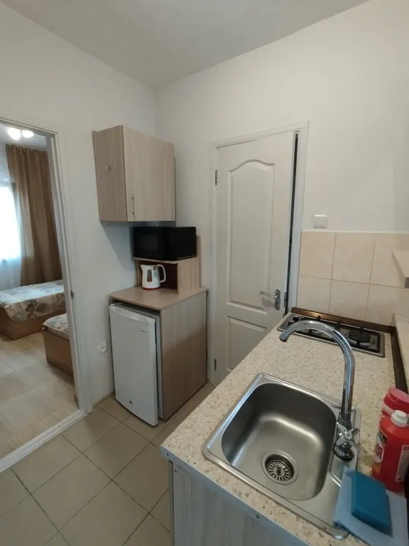 Уютная комната с кухней в частном доме