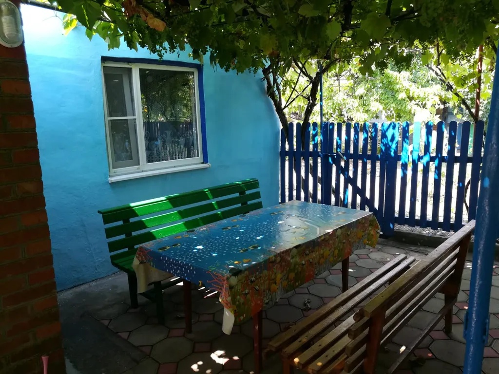 Утопающий в зелени уютный дом