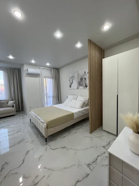 Квартира Квартира Уютная студия с балконом — Сириус