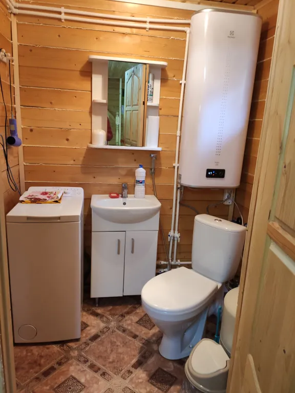 Домик-баня на берегу реки Псижа и выходом в озеро Ильмень