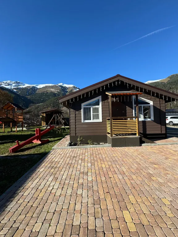 Коттедж Трёхкомнатные апартаменты с видом на горы — Архыз