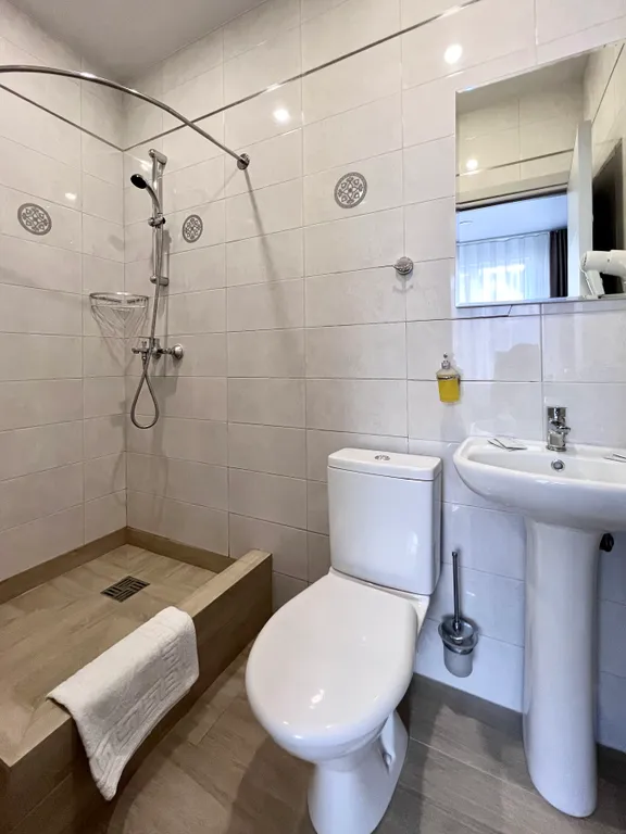 Квартира Квартира Уютный номер с 1 двуспальной или 2 раздельными кроватями — Сириус