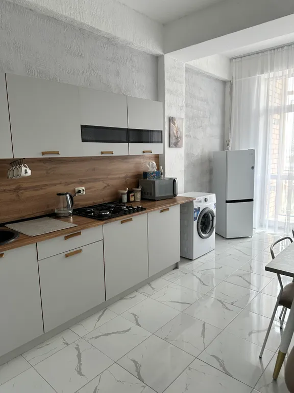 Квартира Уютная квартира с панорамным окном и видом на город — Махачкала