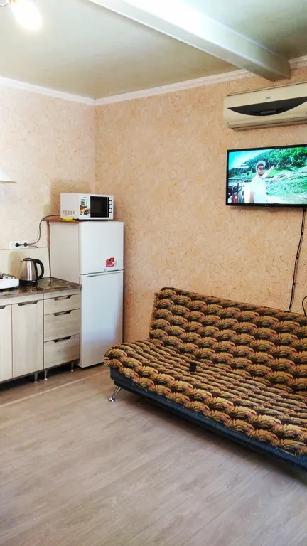 Номер на первом этаже двухэтажного, отдельностоящего дома