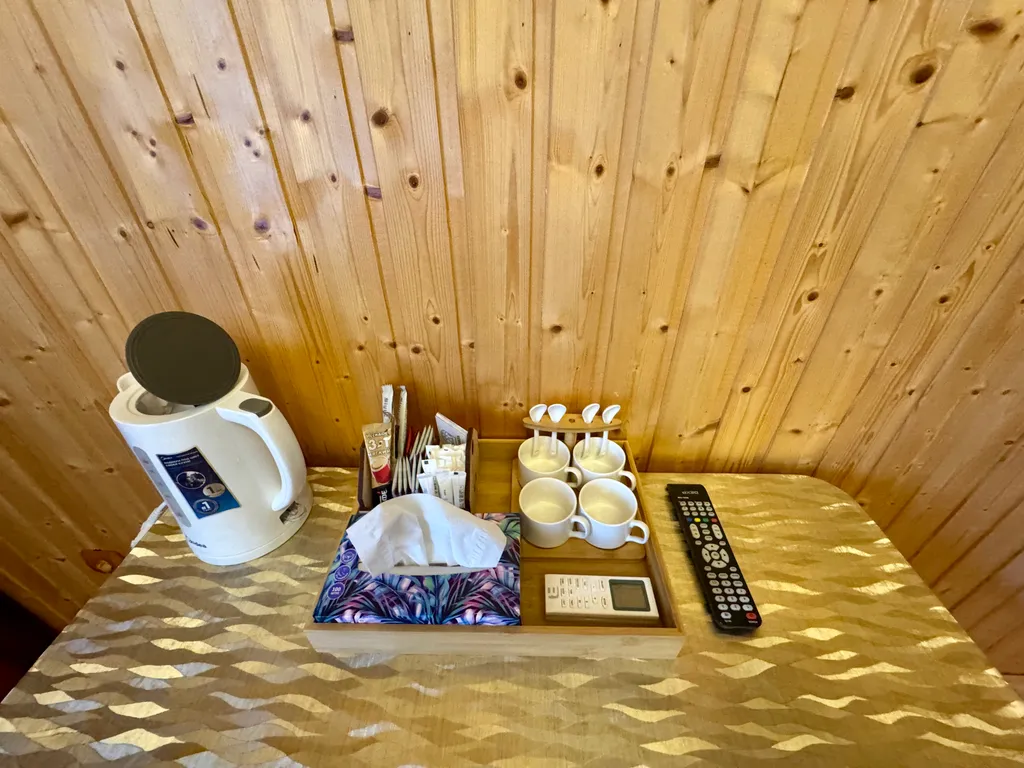 Трехместный номер 11 с балконом и видом на горы