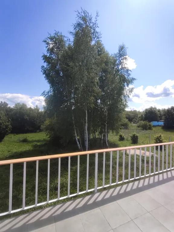 Современный дом с панорамными окнами и сауной