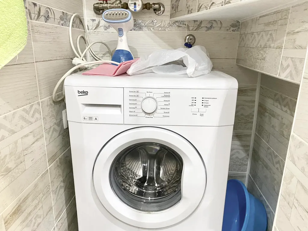 Уютная двухуровневая квартира с обеденной зоной во дворе