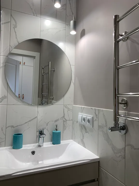 Двухуровневые апартаменты Снегурочка на набережной в центре города