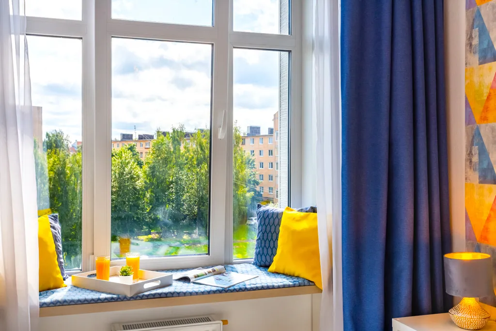 Апартаменты Riverside с панорамным окном в центре