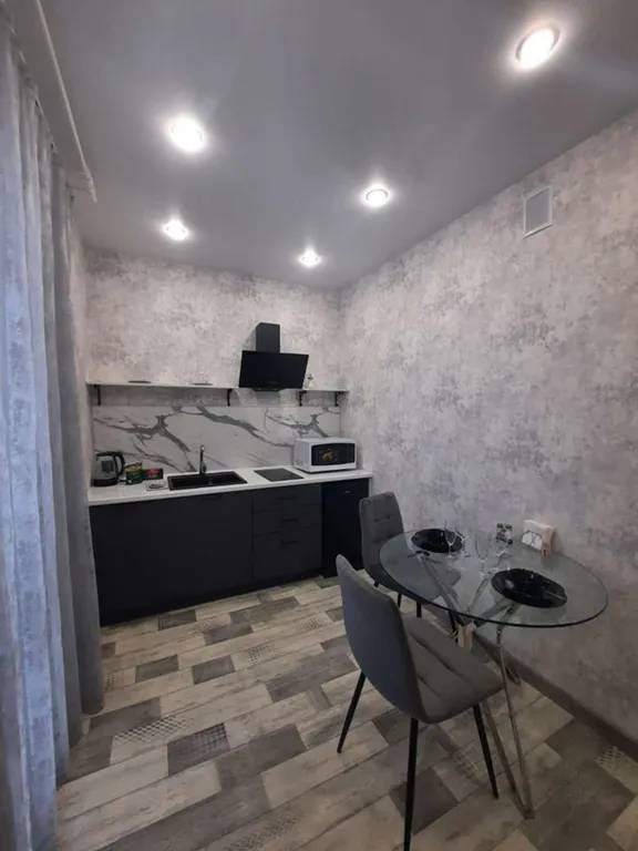 Уютная студия с видом на город