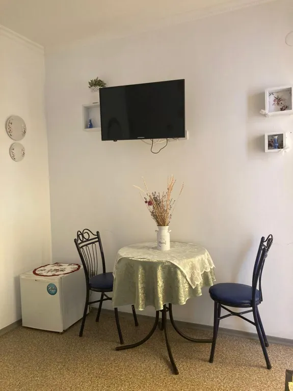 Уютный номер с отдельным входом на террасу с мебелью