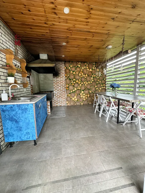 Загородный дом с бассейном и сауной