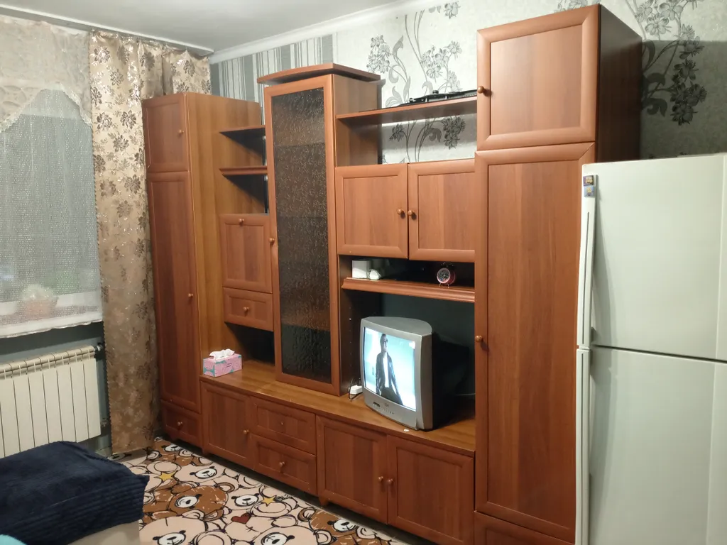 Уютная комната с балконом октябрьский район