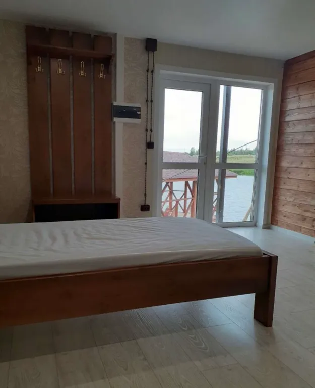 Уютный гостевой дом с баней на берегу озера